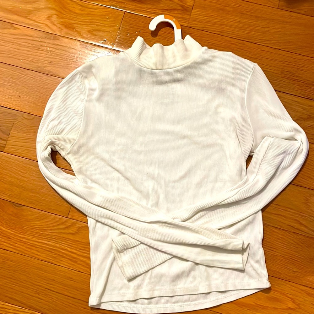 small white turtleneck